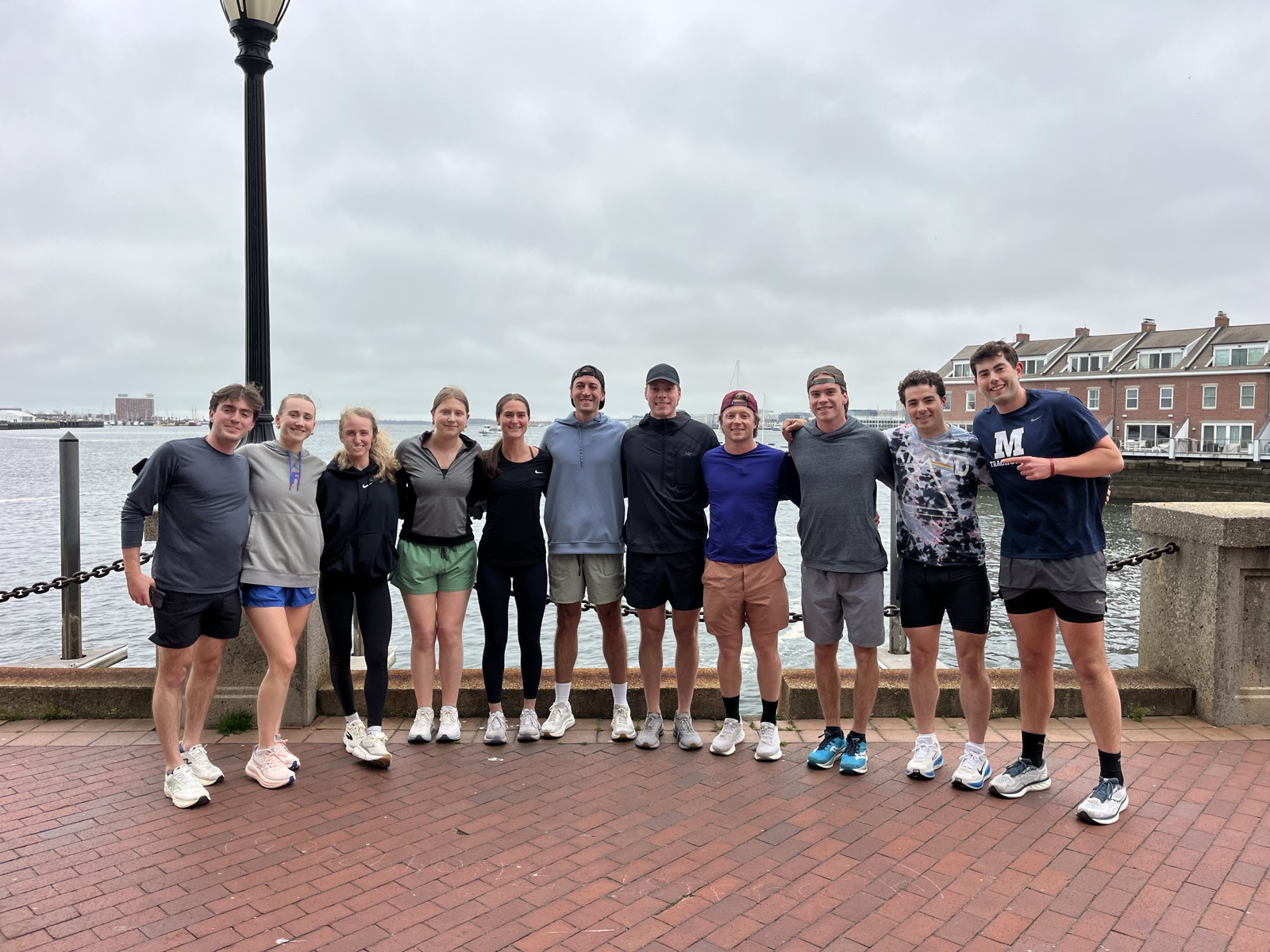 The crew lined up on the Harborwalk after a run
